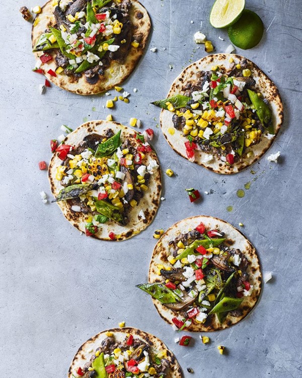Crispy tacos with charred veg & refried beans 