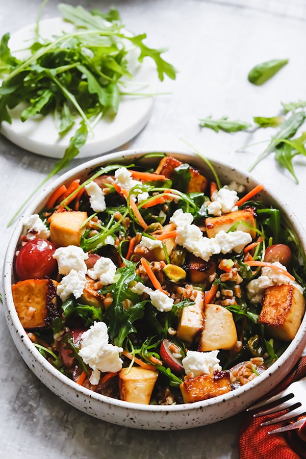 Crispy tofu bowls with grapes, arugula, and honey-ginger vinaigrette