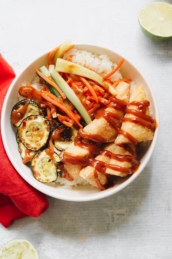 Crispy tofu buddha bowls with peanut sauce and quick-pickled veggies