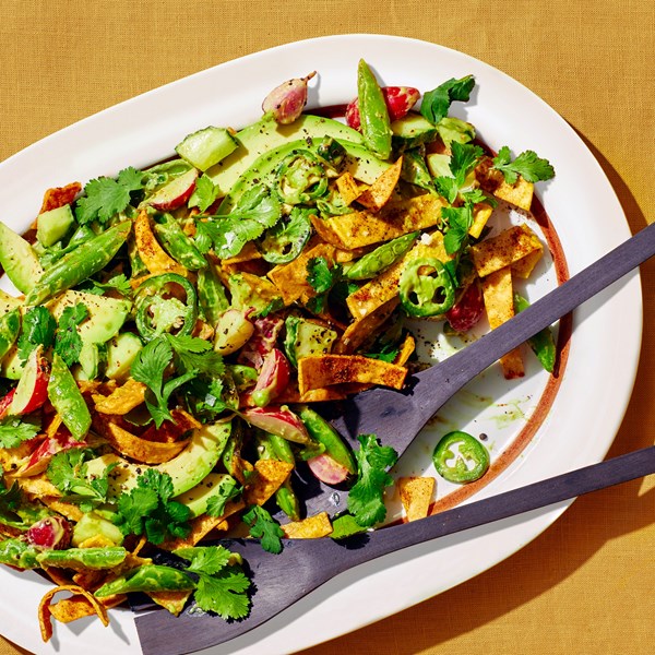 Crispy tortilla salad with snap peas and avocado 