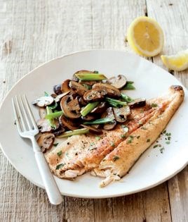 Crispy trout with green onions and mushrooms