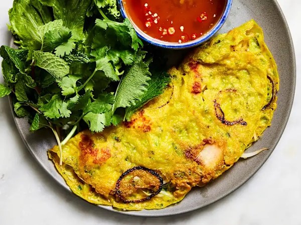 Crispy Vietnamese savory crêpes with pork and shrimp (Bánh xèo)