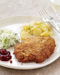 Crispy wiener schnitzel with lingonberry preserves