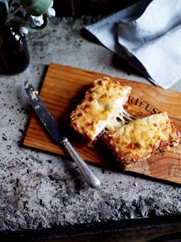 Croque-monsieur with smoked ham, cheese and smoked sausage