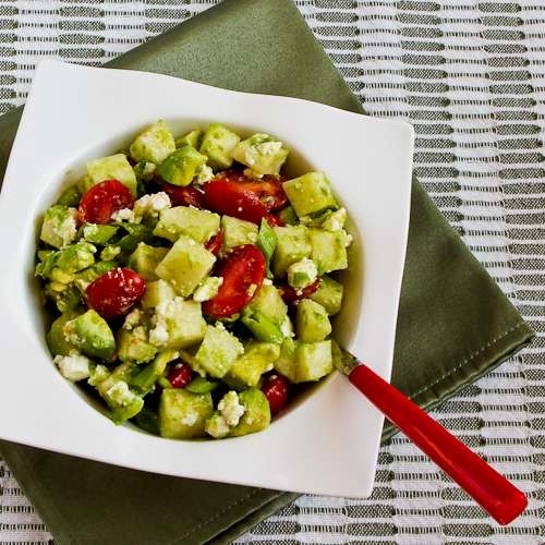 Cross-cultural salad with tomato, avocado, jicama, lime, and feta