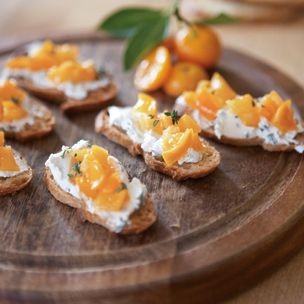 Crostini with herbed chèvre and kumquats