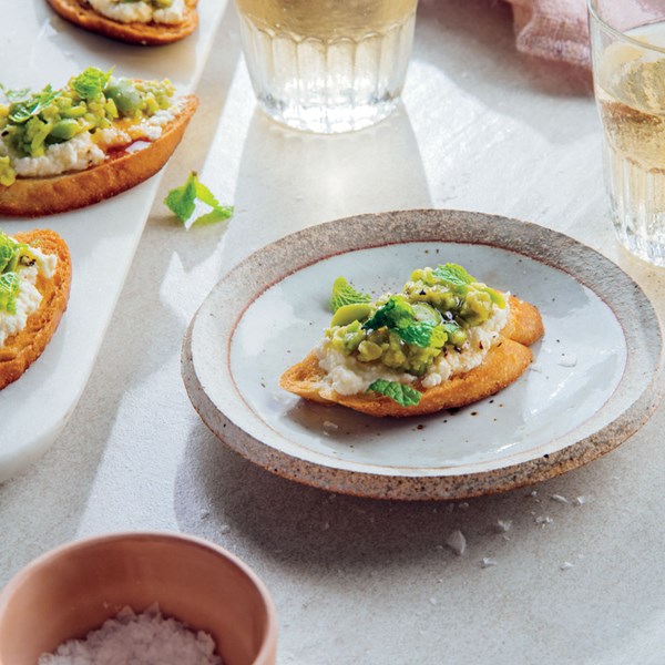 Crostini with ricotta, honey, and fava beans