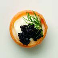 Croustades stuffed with soured cream, caviar and dill