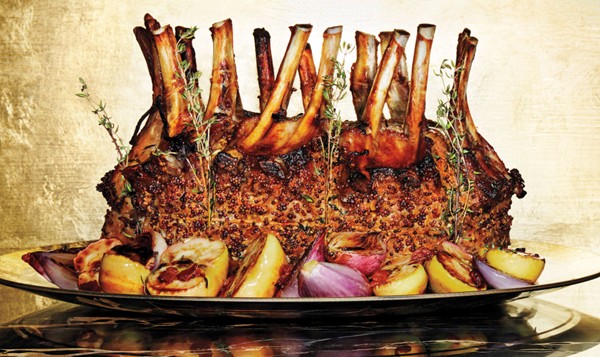 Crown roast of pork with lady apples and shallots