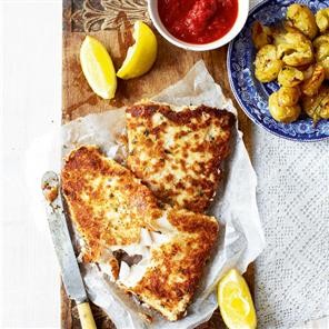 Crumbed fish with thyme potatoes and tomato relish