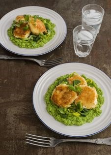 Crumbed goats' cheese on pea purée