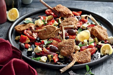 Crumbed lamb cutlets with roast Greek-salad vegetables