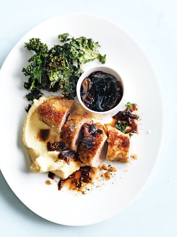Crumbed pork with apple and potato mash and kale chips
