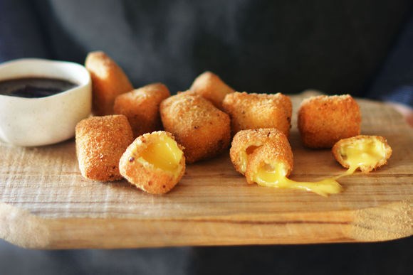 Crumbed triple cream Brie with quince glaze dipping sauce