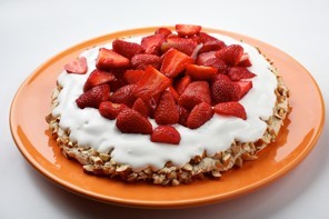Crunchy almond butter meringue with berries and cream