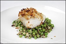 Crunchy crumbed cod with frozen peas