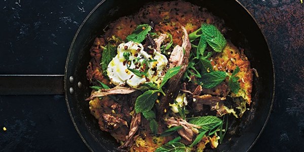 Crunchy potato rostis with pulled lamb, yoghurt and mint
