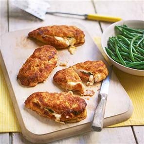 Crunchy, stuffed chicken breasts with green beans in lemon butter