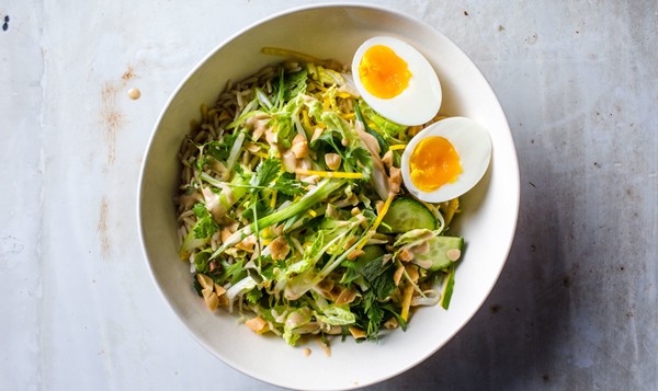 Crunchy veg bowl with warm peanut sauce