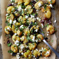 Crushed coriander, olive and feta potatoes