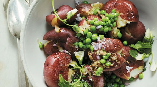 Crushed new potatoes and pea salad with mustard seed dressing