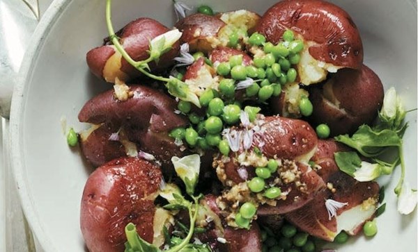 Crushed new potatoes and pea salad with mustard seed dressing