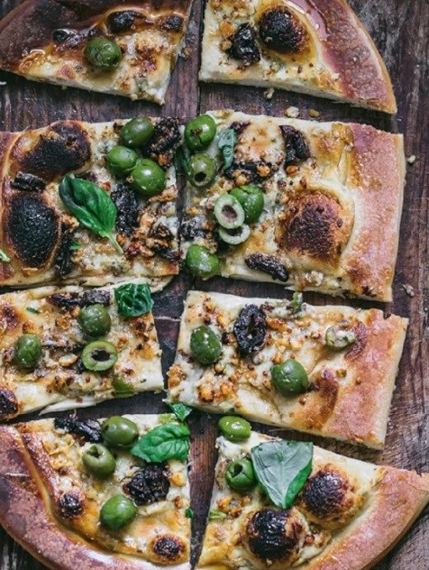 Crushed olive and date white pizza with hot honey