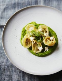 Crushed pea & mint tortellini with pea shoots