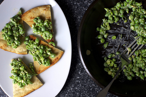 Crushed peas with smoky sesame dressing