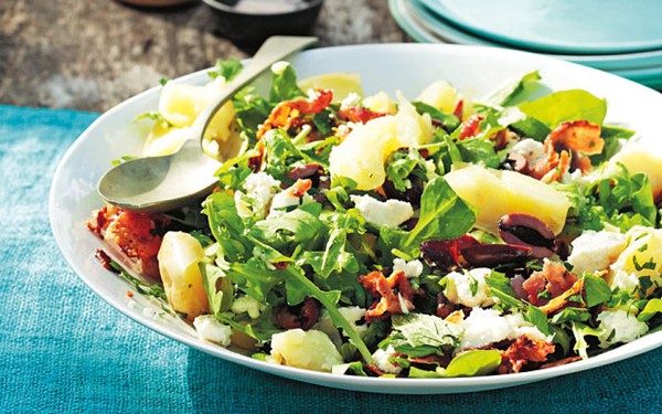 Crushed potatoes with feta, lemon, rocket and olives