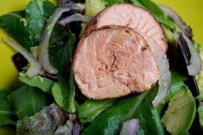 Crusted salmon with avocado and red onion salad