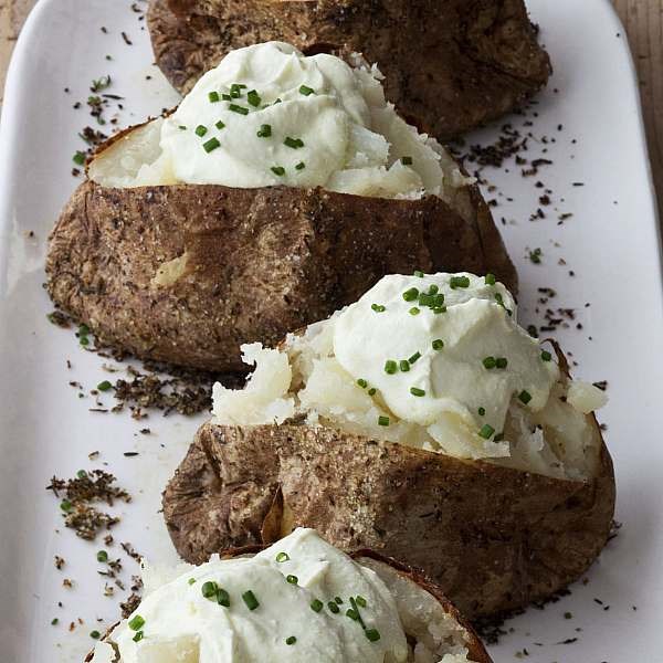 Crusty baked potatoes with whipped feta
