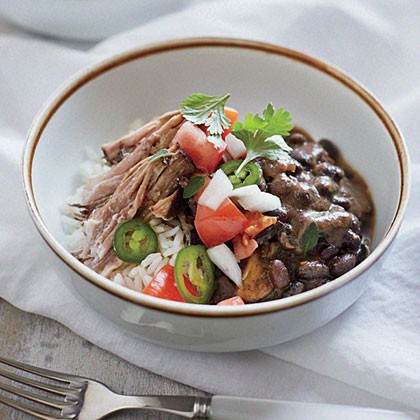Cuban pork shoulder with beans and rice