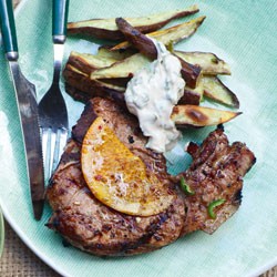 Cuban-style pork chops with kumara chips and chipotle cream