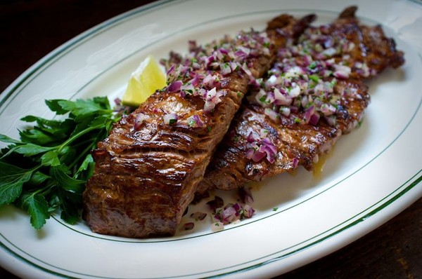 Cuban style skirt steak with classic sour orange mojo