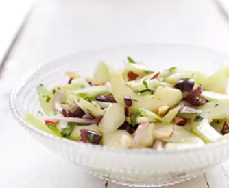 Cucumber salad with olives, oregano, and almonds