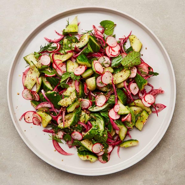 Cucumber salad with sumac, onion and radishes