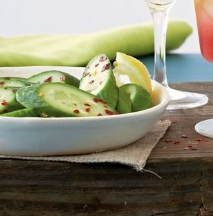 Cucumber with chile flakes, flaky sea salt, and lemon
