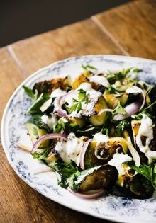 Cucumber with cumin yogurt and parsley