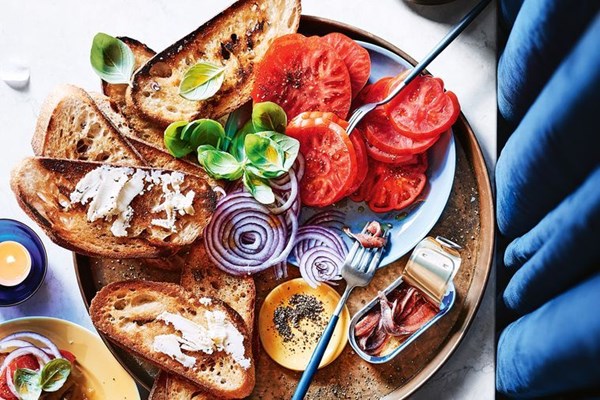 Cultured butter, oxheart tomato and anchovies on sourdough
