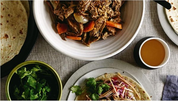 Cumin and chilli pulled lamb shoulder with pickled kumara