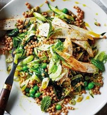 Cumin chicken with giant couscous, courgette, peas and mint