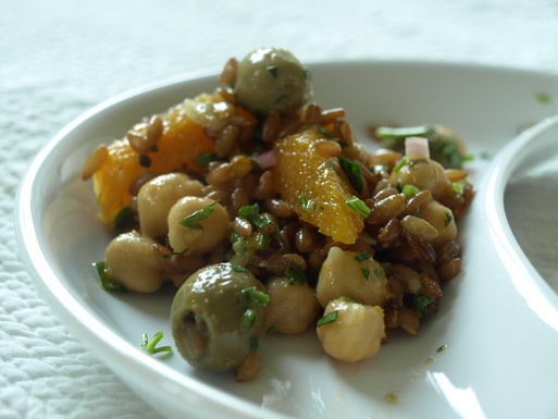 Cumin infused olives in rye garbanzo bean salad with oranges