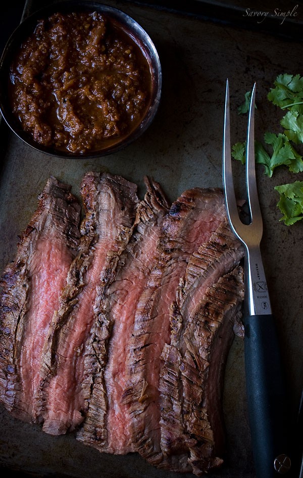 Cumin marinated grilled flank steak with salsa
