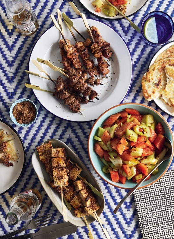 Cumin, salt and pepper chicken skewers with spicy melon and celery salad