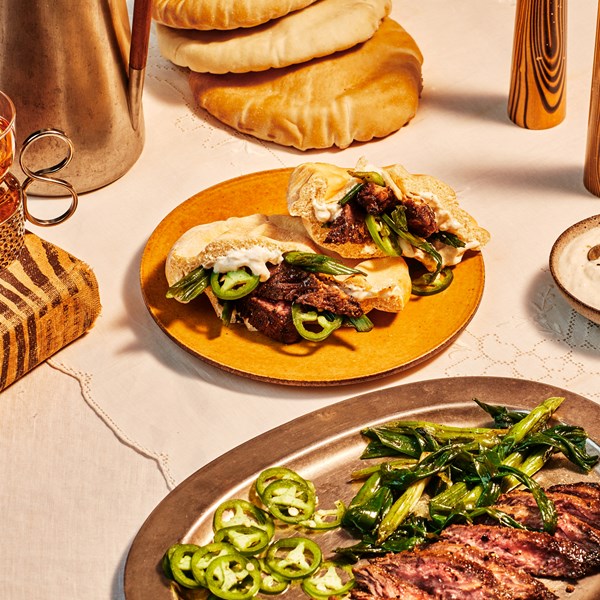 Cumin steak and scallion pitas 