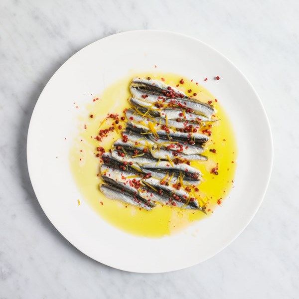 Cured anchovies, pink peppercorns, orange