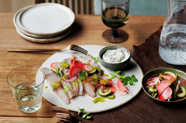 Cured barramundi with pickled vegetables and lemon herb cream