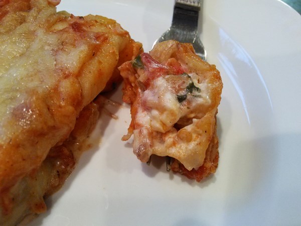 Curly dock and chicken enchiladas