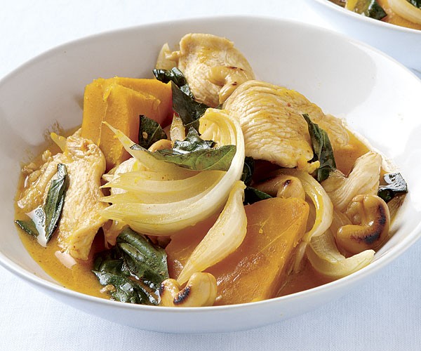 Curried chicken stew with squash and cashews